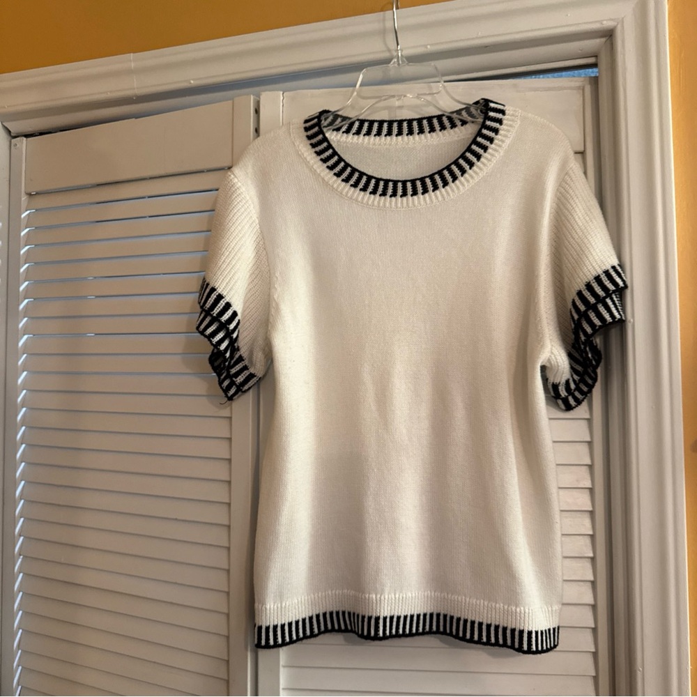 White and Black Knit Top with embroidery accents